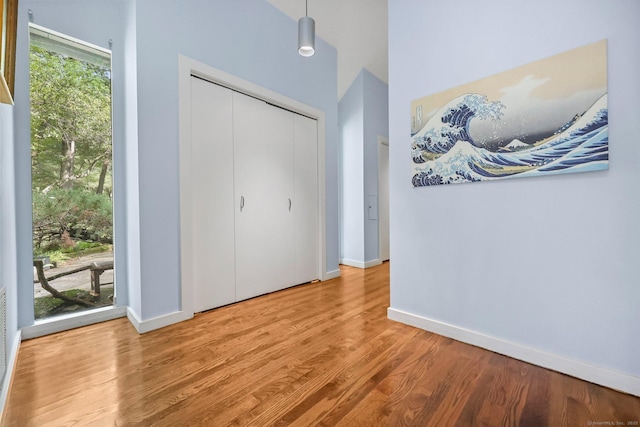 22 Blackberry Dr E, Stamford, CT 06903 - entrance foyer featuring wood finished floors and a towering ceiling