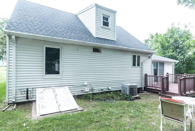 19 Garfield Rd, Bristol, CT 06010 - back of house with a wooden deck, roof with shingles, and a lawn