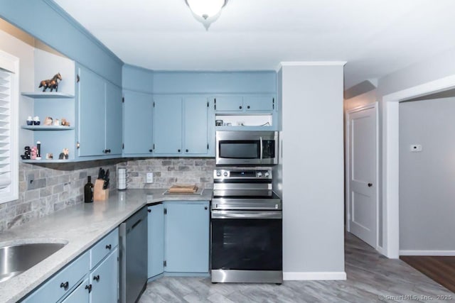 19 Garfield Rd, Bristol, CT 06010 - kitchen with appliances with stainless steel finishes, open shelves, tasteful backsplash, light countertops, and light wood-style floors