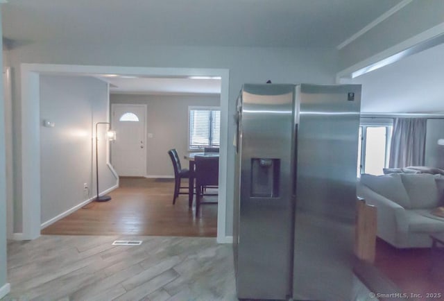 19 Garfield Rd, Bristol, CT 06010 - kitchen featuring stainless steel fridge and wood finished floors