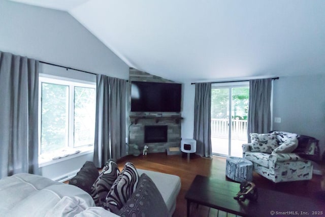 19 Garfield Rd, Bristol, CT 06010 - living area featuring a stone fireplace, lofted ceiling, and wood finished floors