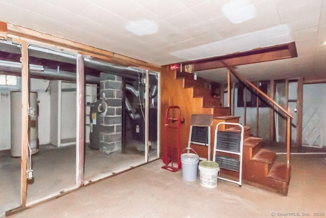 19 Garfield Rd, Bristol, CT 06010 - finished below grade area featuring electric water heater and stairs