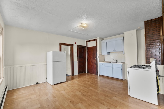 240 Washington St, New Britain, CT 06051 - kitchen with white appliances, light wood-style floors, a textured ceiling, a baseboard radiator, and light countertops