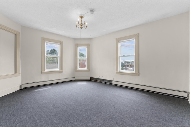240 Washington St, New Britain, CT 06051 - carpeted empty room featuring a chandelier, a textured ceiling, and a smoke detector