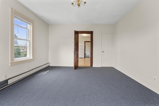 240 Washington St, New Britain, CT 06051 - carpeted empty room featuring baseboard heating and baseboards