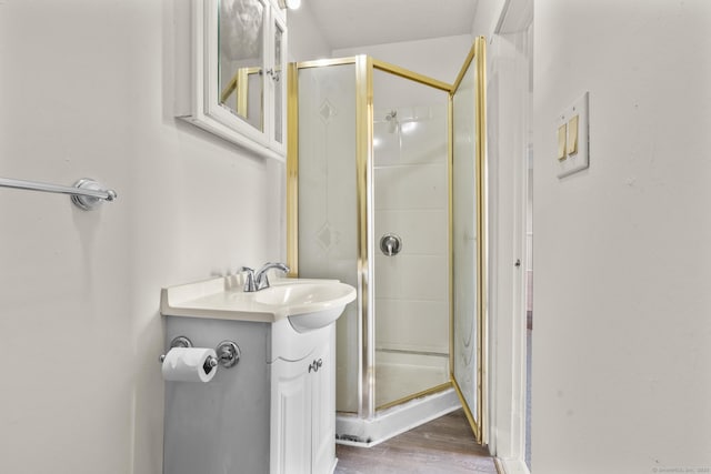 240 Washington St, New Britain, CT 06051 - full bathroom featuring a stall shower, vanity, and wood finished floors