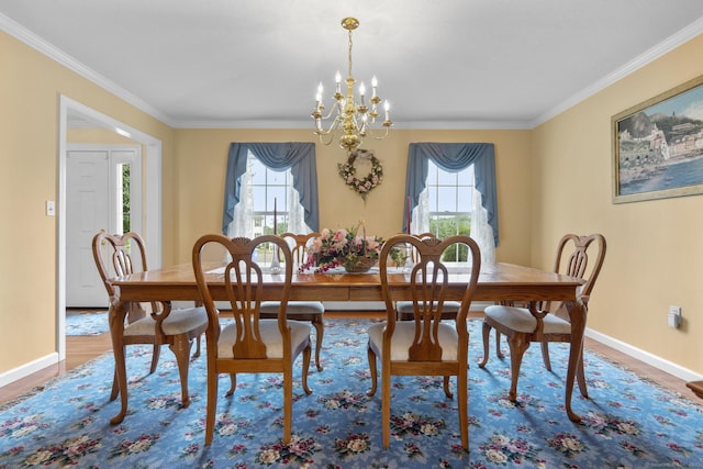 28 Fieldstone Path, Newington, CT 06111 - dining area featuring a chandelier, ornamental molding, healthy amount of natural light, and wood finished floors