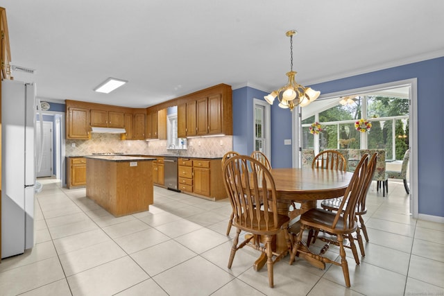 28 Fieldstone Path, Newington, CT 06111 - dining space featuring a chandelier, healthy amount of natural light, light tile patterned floors, and ornamental molding