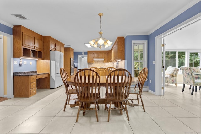 28 Fieldstone Path, Newington, CT 06111 - dining area featuring light tile patterned flooring, healthy amount of natural light, ornamental molding, and a chandelier