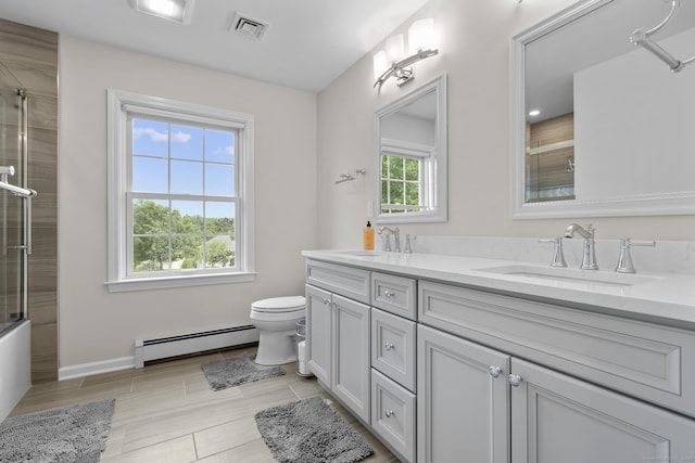 28 Fieldstone Path, Newington, CT 06111 - bathroom with baseboard heating, double vanity, and shower / bath combination with glass door