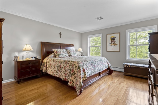 28 Fieldstone Path, Newington, CT 06111 - bedroom with light wood-type flooring, crown molding, and a baseboard heating unit