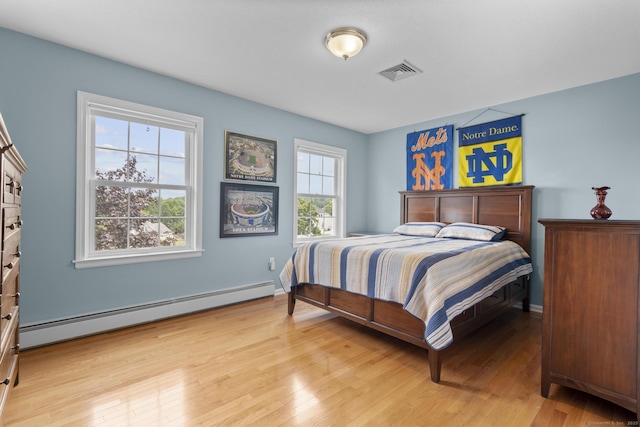28 Fieldstone Path, Newington, CT 06111 - bedroom featuring baseboard heating and light wood-type flooring
