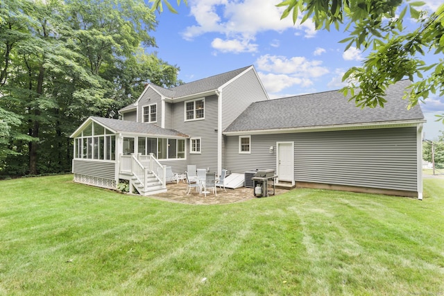 28 Fieldstone Path, Newington, CT 06111 - back of house with a sunroom, a lawn, a patio, and roof with shingles