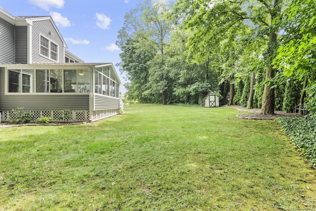 28 Fieldstone Path, Newington, CT 06111 - view of green lawn featuring a sunroom and a storage unit