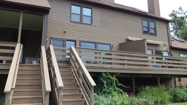 4 Rosewood Cir Unit 4, Monroe, CT 06468 - back of house with stairway, a chimney, and a deck