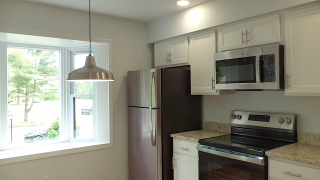 4 Rosewood Cir Unit 4, Monroe, CT 06468 - kitchen featuring stainless steel appliances, hanging light fixtures, white cabinets, and recessed lighting