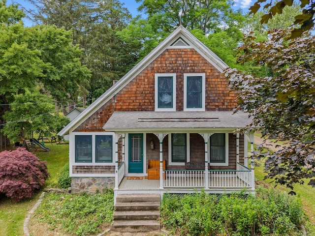 18 Cards Mill Rd, Columbia, CT 06237 - view of front facade featuring covered porch and a shingled roof