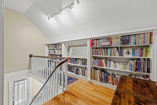 18 Cards Mill Rd, Columbia, CT 06237 - hall featuring an upstairs landing, wood finished floors, rail lighting, and lofted ceiling