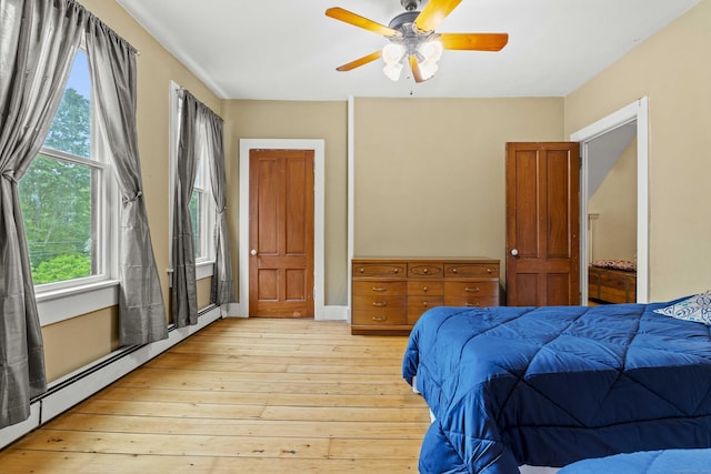 18 Cards Mill Rd, Columbia, CT 06237 - bedroom featuring a baseboard heating unit, light wood-type flooring, and ceiling fan