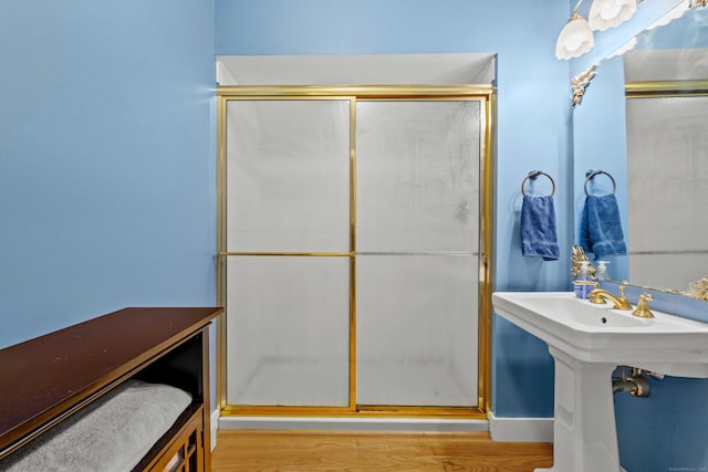 18 Cards Mill Rd, Columbia, CT 06237 - bathroom featuring a stall shower and wood finished floors