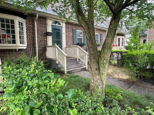 118 Sims St, Bridgeport, CT 06604 - doorway to property with brick siding