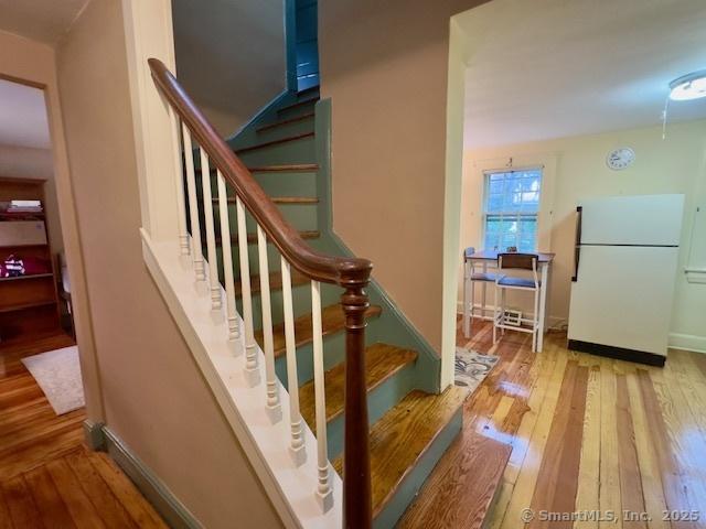 118 Sims St, Bridgeport, CT 06604 - stairs with hardwood / wood-style floors