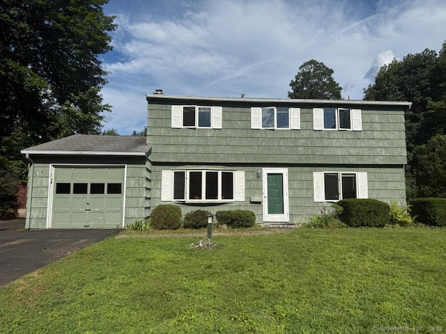 9 Meadow Brook Rd, Brookfield, CT 06804 - colonial home with a garage, asphalt driveway, and a front yard