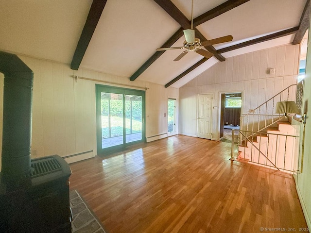 9 Meadow Brook Rd, Brookfield, CT 06804 - unfurnished living room featuring a baseboard radiator, wood finished floors, a ceiling fan, and wood walls