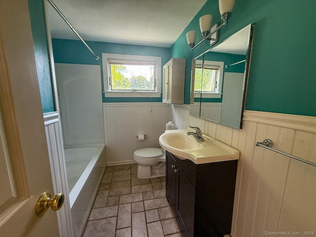 9 Meadow Brook Rd, Brookfield, CT 06804 - bathroom with wainscoting, vanity, bathing tub / shower combination, and stone finish flooring