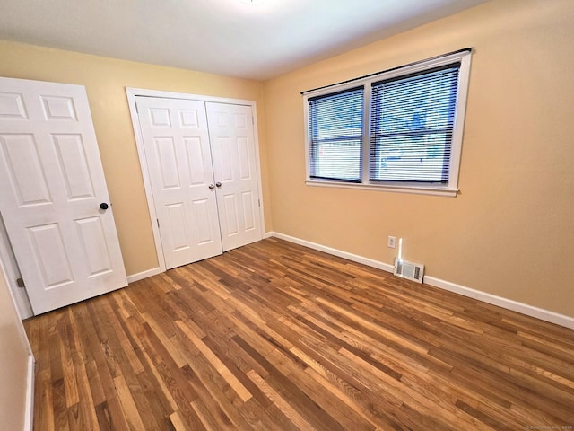 266 Cianci Rd, New Britain, CT 06053 - unfurnished bedroom with wood finished floors and a closet
