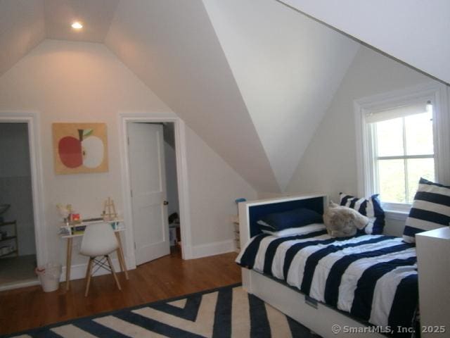 65 Sherwood Pl Unit 65, Greenwich, CT 06830 - bedroom featuring lofted ceiling and wood finished floors