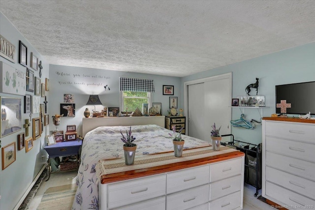 25 Ridgewood Rd, Willington, CT 06279 - bedroom with a textured ceiling and a closet