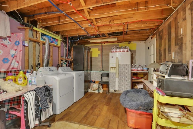 25 Ridgewood Rd, Willington, CT 06279 - unfinished below grade area with white refrigerator with ice dispenser, separate washer and dryer, and wood finished floors