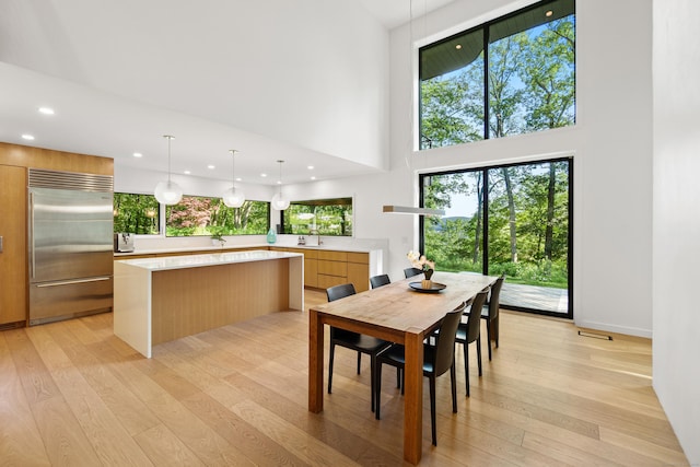 9 Overlook Dr, Salisbury, CT 06039 - dining room with light wood finished floors, a high ceiling, healthy amount of natural light, and recessed lighting