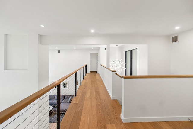 9 Overlook Dr, Salisbury, CT 06039 - corridor with an upstairs landing, light wood-style flooring, and recessed lighting