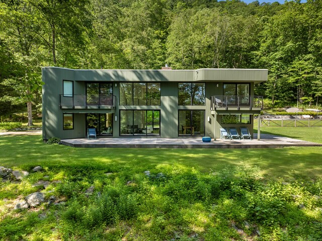 9 Overlook Dr, Salisbury, CT 06039 - view of playground with a forest view and a wooden deck