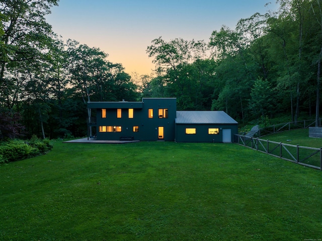 9 Overlook Dr, Salisbury, CT 06039 - view of front of home with a fenced backyard and a metal roof