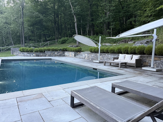 9 Overlook Dr, Salisbury, CT 06039 - outdoor pool featuring an outdoor living space, a forest view, and a patio area