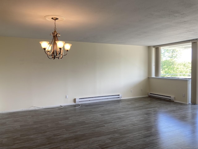 50 Birdseye St Unit 104, Stratford, CT 06615 - spare room with a baseboard heating unit, a chandelier, and dark wood finished floors
