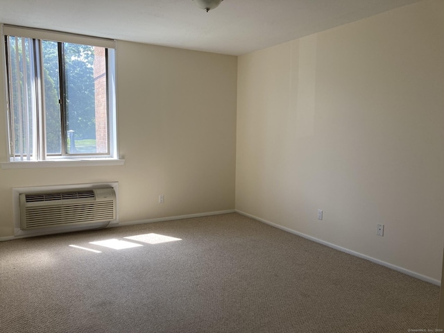 50 Birdseye St Unit 104, Stratford, CT 06615 - carpeted empty room with healthy amount of natural light and a wall mounted air conditioner