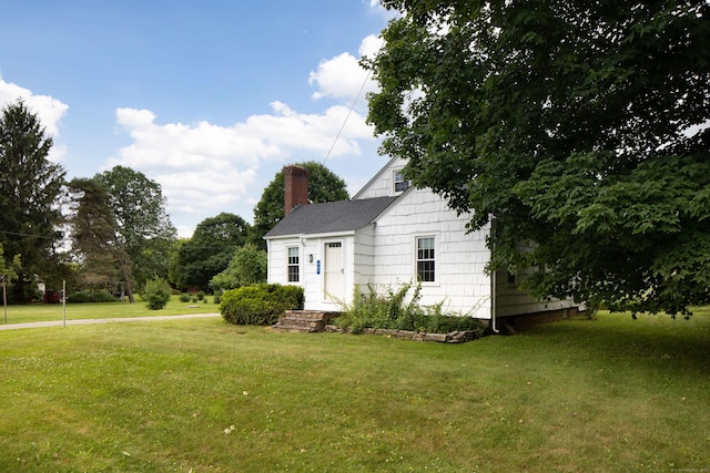 367 Norfolk Rd, North Canaan, CT 06024 - view of front of property with a front lawn and a chimney