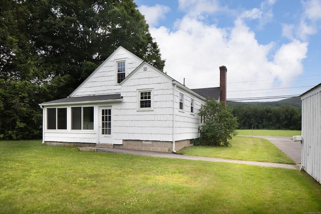 367 Norfolk Rd, North Canaan, CT 06024 - back of property featuring a lawn