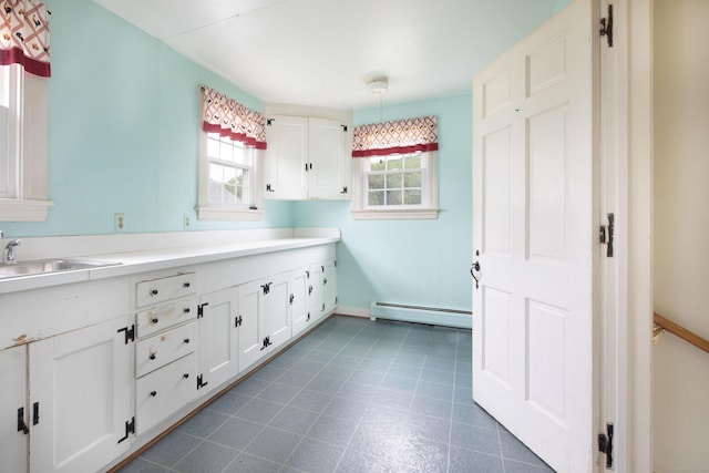 367 Norfolk Rd, North Canaan, CT 06024 - bathroom featuring a baseboard heating unit and a sink
