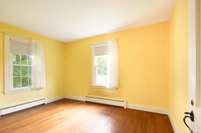 367 Norfolk Rd, North Canaan, CT 06024 - unfurnished room featuring baseboard heating, healthy amount of natural light, and wood finished floors