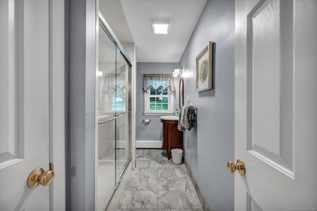 266 Ballfall Rd, Middletown, CT 06457 - bathroom featuring vanity, marble finish floors, and a shower stall