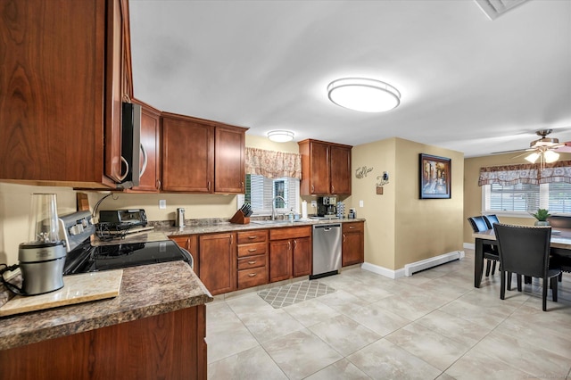 266 Ballfall Rd, Middletown, CT 06457 - kitchen featuring appliances with stainless steel finishes, a baseboard heating unit, ceiling fan, and light tile patterned floors