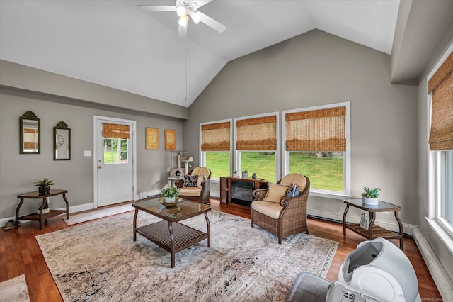 266 Ballfall Rd, Middletown, CT 06457 - living room with vaulted ceiling, a ceiling fan, wood finished floors, and a baseboard heating unit
