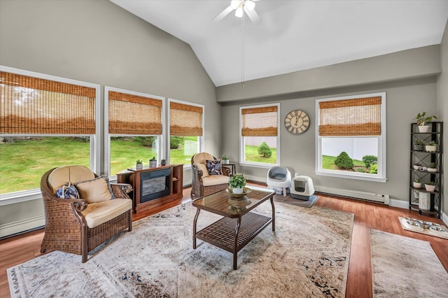 266 Ballfall Rd, Middletown, CT 06457 - living area featuring a baseboard heating unit, lofted ceiling, wood finished floors, and ceiling fan