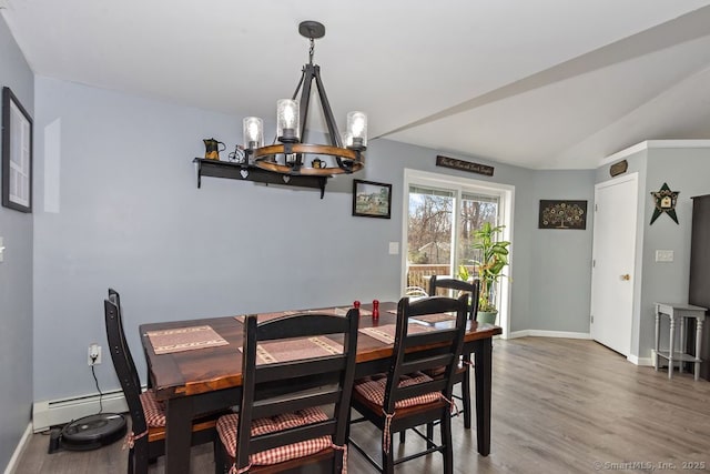 31 Bob White Way, Plainfield, CT 06354 - dining room featuring a chandelier, wood finished floors, and a baseboard heating unit