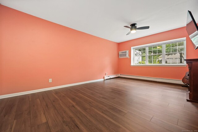 1060 New Haven Ave Apt 7, Milford, CT 06460 - unfurnished room featuring baseboard heating, ceiling fan, a wall mounted AC, and dark wood-type flooring